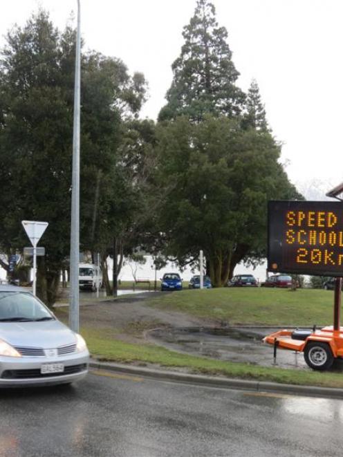 A warning to motorists on an electronic message board at the One Mile Roundabout, Queenstown,...