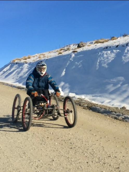 Aaron Ewen, of Wanaka, test drives a downhill quad mountain bike on the Cardrona Alpine Resort...