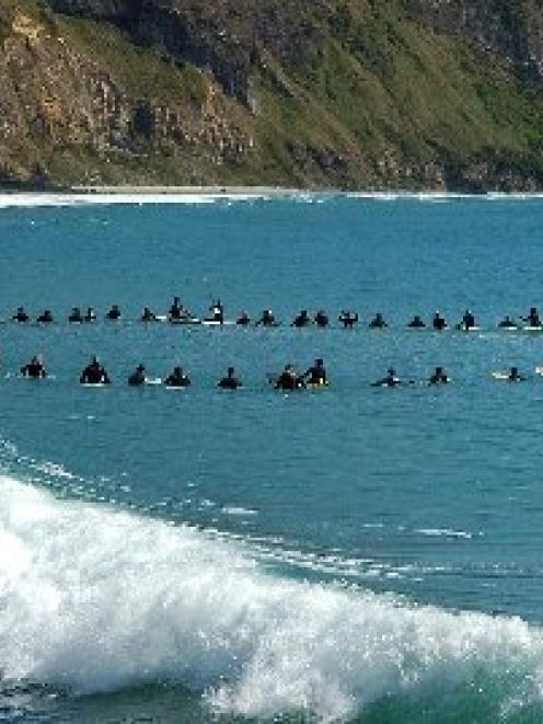 About 90 surfers in Dunedin hit the water at Aramoana on Saturday to show their support for the...