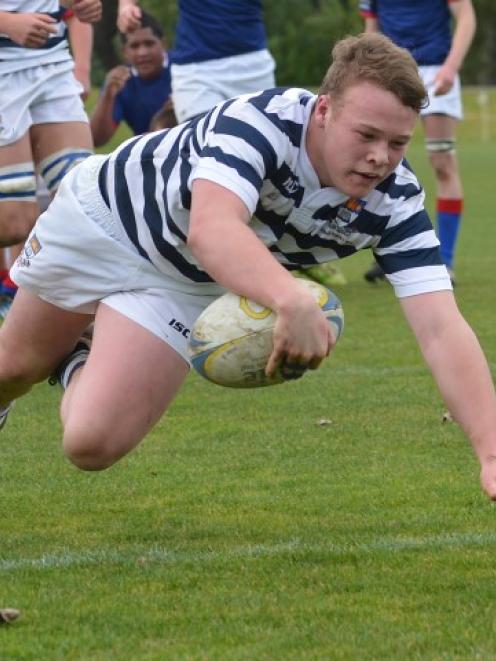 Action from the OBHS v St Kevin's College match at University Oval in Dunedin. Photo Peter McIntosh