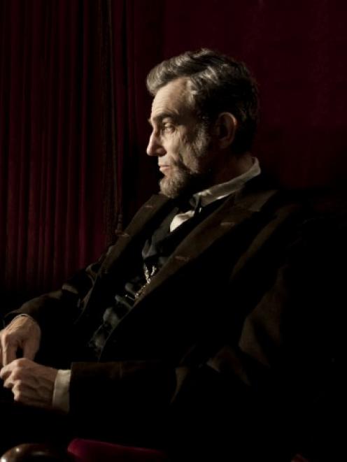 Actor Daniel Day-Lewis portrays United States president Abraham Lincoln in a scene from director...