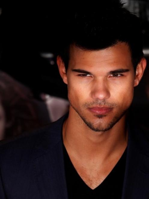 Actor Taylor Lautner arrives for the European premiere of 'The Twilight Saga: Breaking Dawn Part...