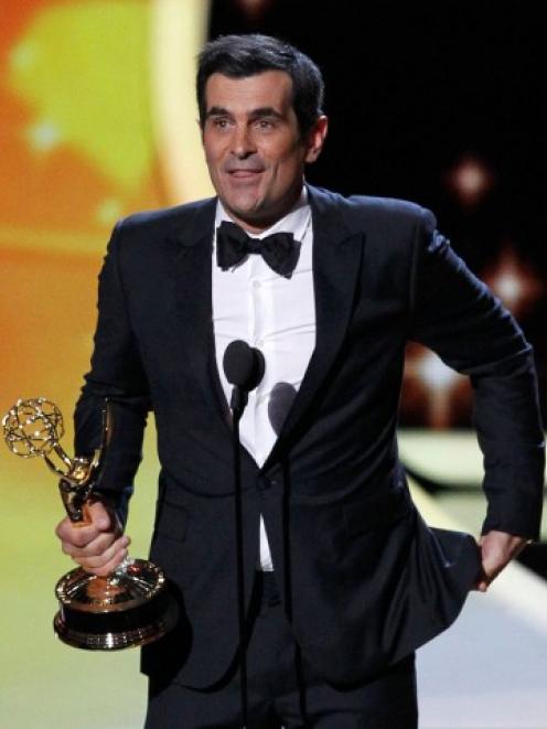 Actor Ty Burrell from the television series 'Modern Family' accepts the award for outstanding...