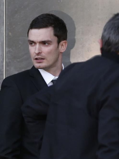 Adam Johnson leaves court. Photo: Reuters