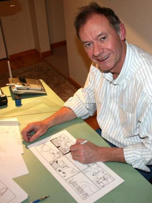 Adrian Raeside, creator of the Otago Daily Times' new cartoon, at work. Photo supplied.