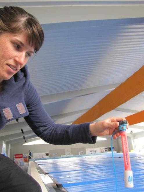 Ailsa Rollinson checks the Wanaka swimming pool's water temperature yesterday. Photo by Marjorie...