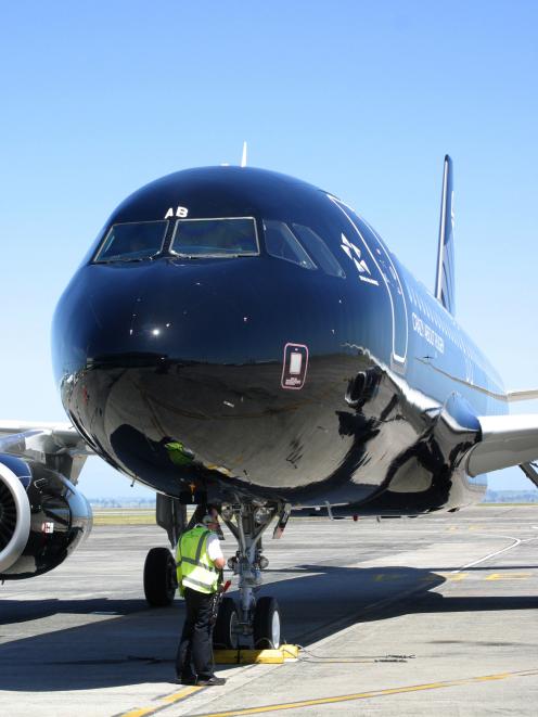 Air New Zealand's new black Airbus A320 arrives from France at Auckland airport this month.Credit...