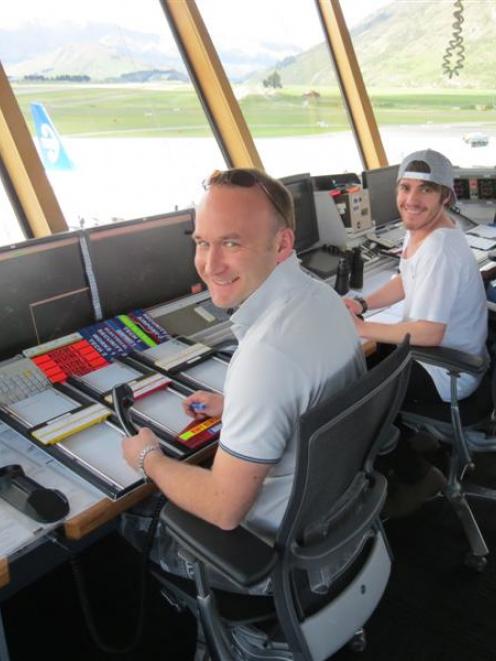 Airways New Zealand staff members (from left) air traffic controllers Andrew Turner and Nick Gale...