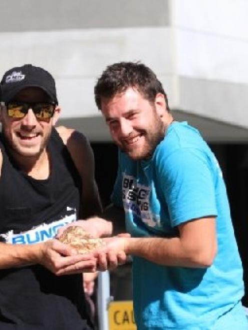 AJ Hackett Bungy crew members Gabe Reid, left, and James Marshall with a 1.44kg nugget of gold...