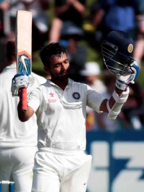 Ajinkya Rahane celebrates after reaching his century. Photos: REUTERS/Anthony Phelps