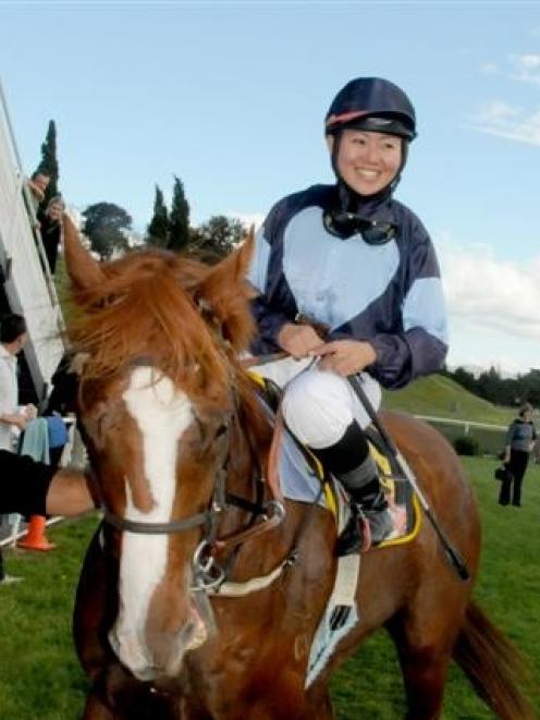 Akane Yamamoto, the Japanese rider, returns to scale after her first New Zealand win on Ambaarun...