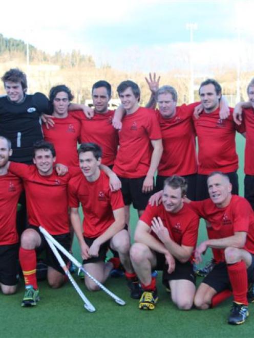 Albany A celebrates its fourth win in a row in the premier men's club final at the McMillan...