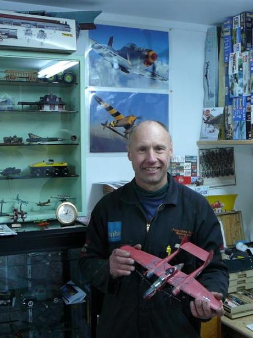 Alexandra man Steve Hills is surrounded by some of his 400-plus models he has collected and...