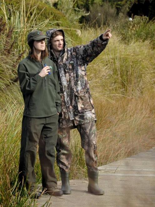 Alice wears a Flood Wind and Water block bush shirt ($129) and Roar Performance pants ($199) both...