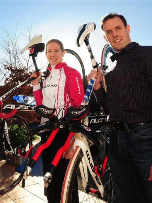 Alison Shanks (left) and Mark Falcous celebrate their BikeNZ awards with a cycle ride yesterday....