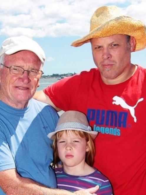 Alistair Kennedy (left), granddaughter Molly and her father, Simon Butler, after yesterday's...