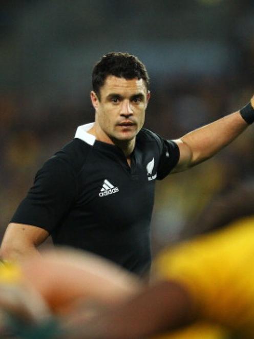 All Black first five Dan Carter sets up behind a scrum during the Bledisloe Cup match between...