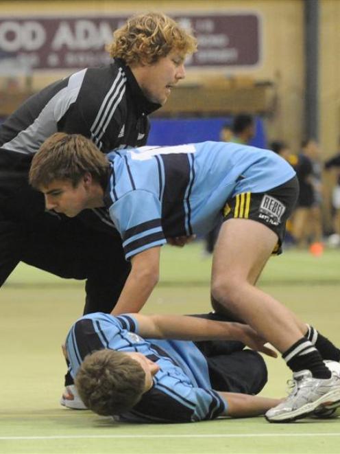 All Black hooker Aled de Malmanche teaches King's High School hooker Max Aitkenhead (16) the...