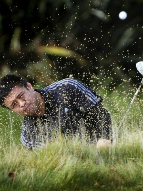 All Black Keven Mealamu shows a delicate touch escaping from a green-side bunker on the fourth...