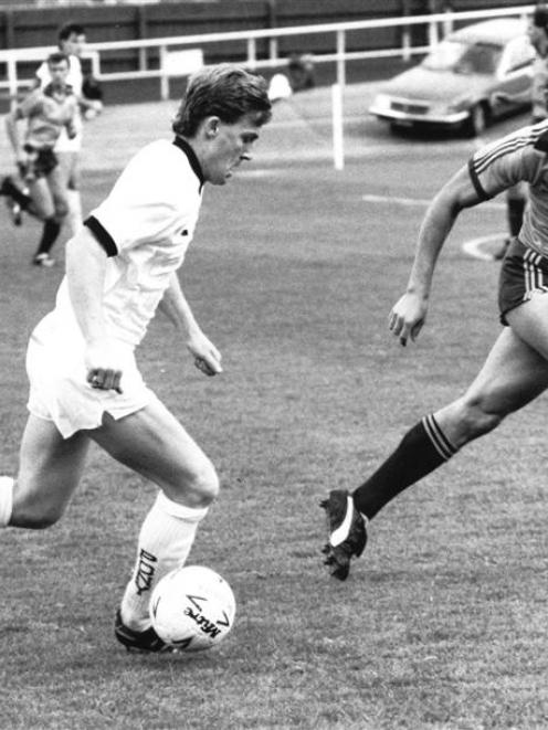 All Whites and Otago stalwart Mike McGarry challenges Australia's Oscar Crino during the match at...