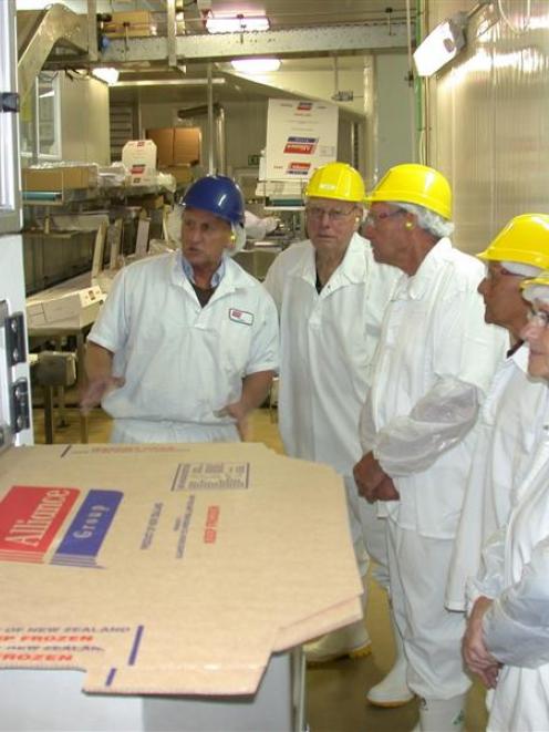 Alliance Group's Pukeuri meat processing plant beef boning room supervisor Greg Smith (left)...