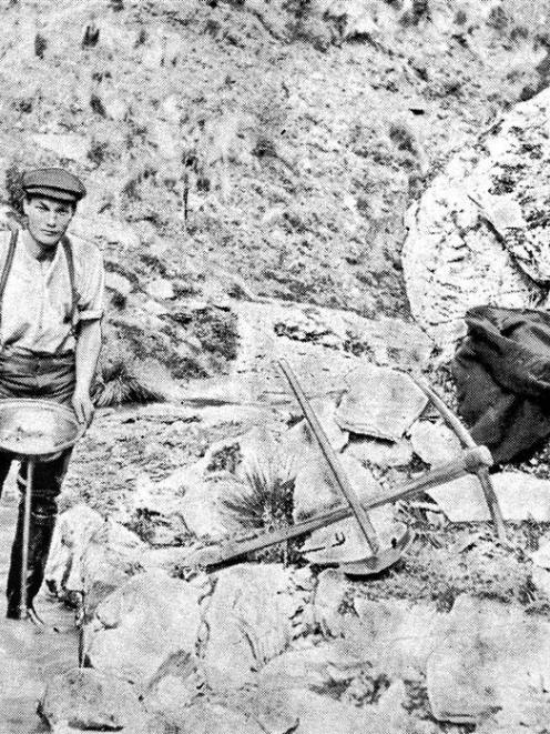 Alluvial mining at Skippers: a prospector at work. - <i>Otago Witness</i>, 5.4.1911. COPIES OF...