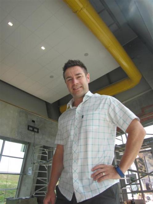 Alpine Health & Fitness manager Richie Heap  is all smiles after construction on the gym's new...