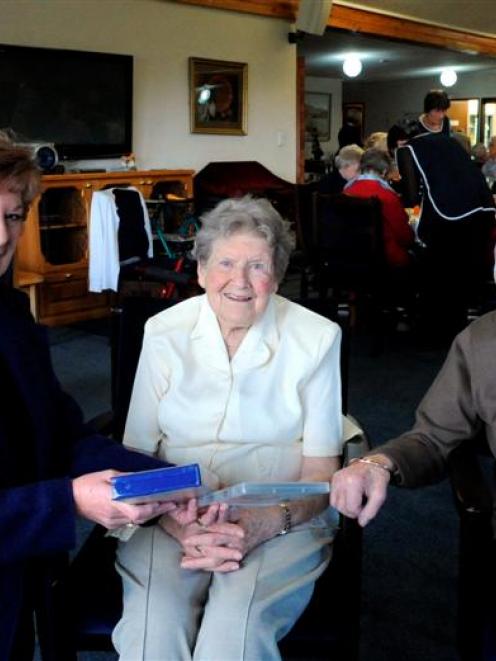 Altrusa Club of Taieri member Glennys Espie (left) with Brooklands Resthome residents Gwenda...
