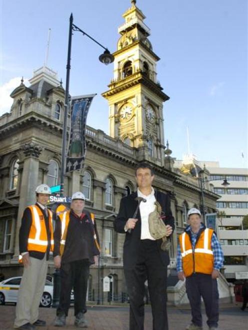 Amalgamated Builders Ltd director and area manager Richard Johnston (foreground) and (from left)...