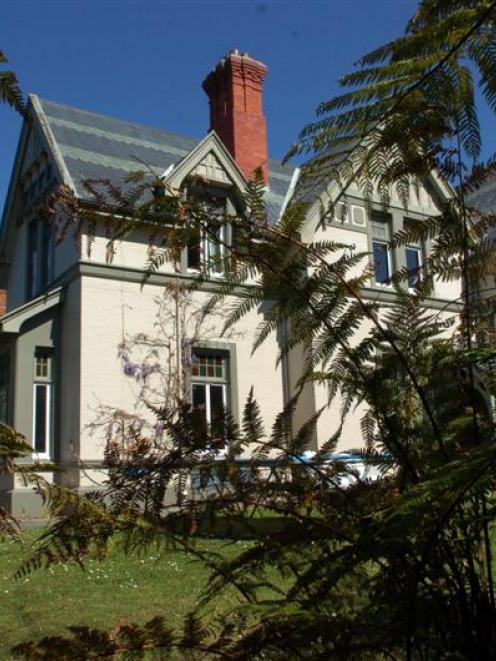 Among the items accumulated by Michael Swann is the historic home Ferntree Lodge. Photo from ODT...