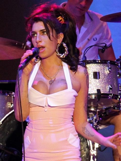 Amy Winehouse performs in Florianopolis, Brazil in January. (AP Photo/Nabor Goulart, File)
