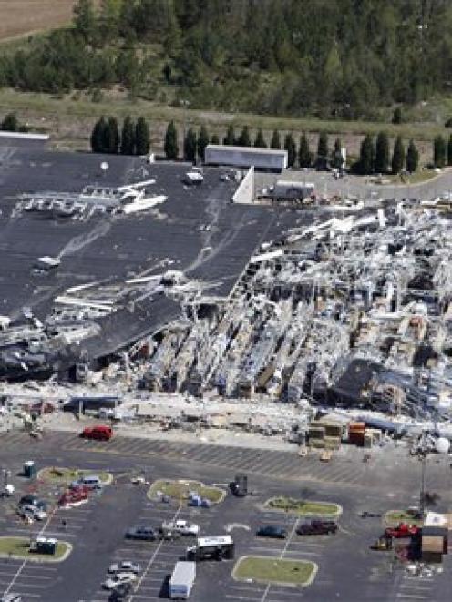 An aerial photo shows tornado damage at the Lowes Home Improvement Center in Sanford, North...