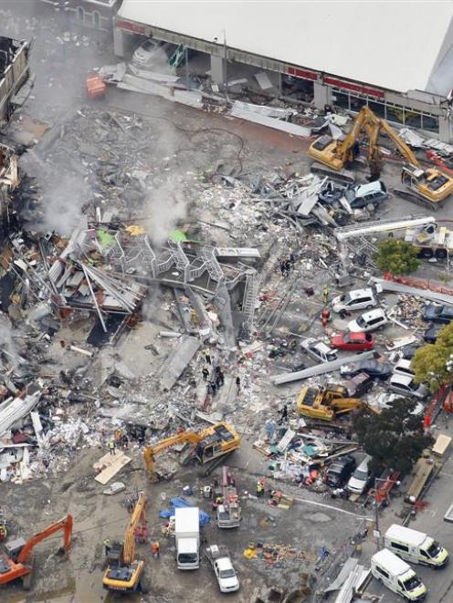 An aerial view of emergency services working at the ruined CTV building in central Christchurch....