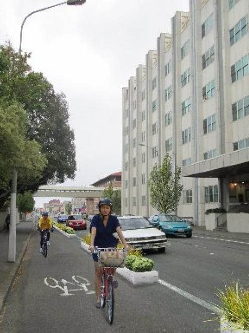 An artist's impression of a one-directional cycle lane in Cumberland St, Dunedin. Image from NZTA.