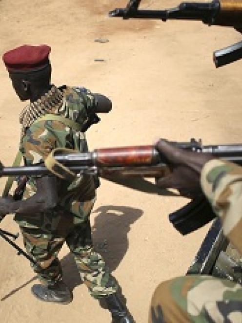 An SPLA soldier in Juba yesterday as African mediators sought to meet rivals to South Sudan's...
