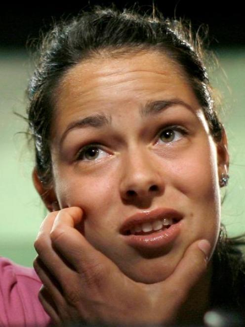 Ana Ivanovic of Serbia talks to the media at a press conference following her third round loss....