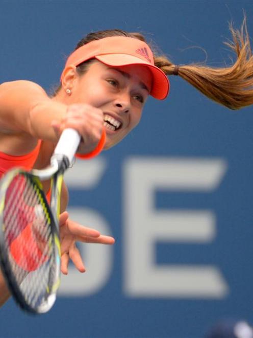 Ana Ivanovic returns a shot during her first round US Open loss. Photo: Reuters.