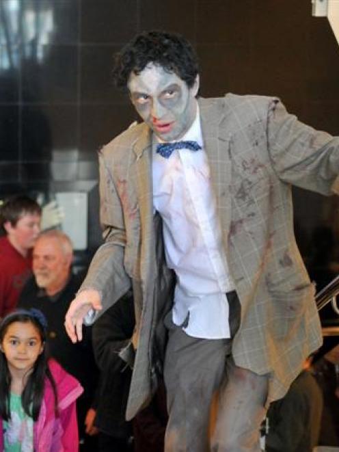 Andersons Bay School pupil Jake Remon (left, 10) joins the zombie tour led by science...
