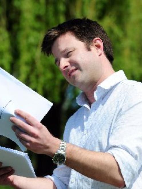 Andrew Porteous looks over a proof of his crime novel, which has won an international competition...