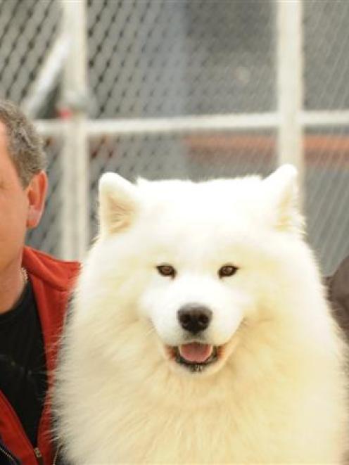 Andy and Denise Reeve, who own the Lealsam Retreat dog kennel near Mosgiel, with their dog Hugo....