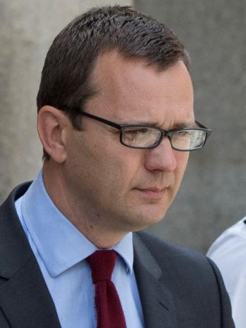 Andy Coulson leaves the Old Bailey courthouse in London. REUTERS/Neil Hall