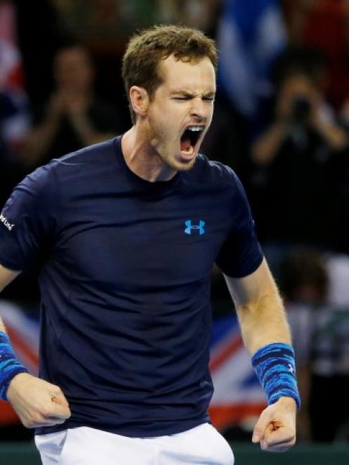 Andy Murray celebrates his victory over John Isner. Action Images via Reuters / Andrew Boyers...
