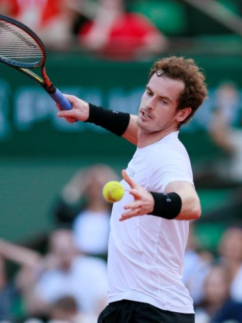 Andy Murray in action against Novak Djokovic during their French Open semifinal. Action Images...