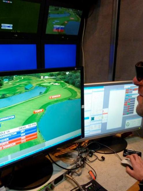 Animation Research operator Ben Sharp sets up 3D graphics for the Ryder Cup golf tournament....