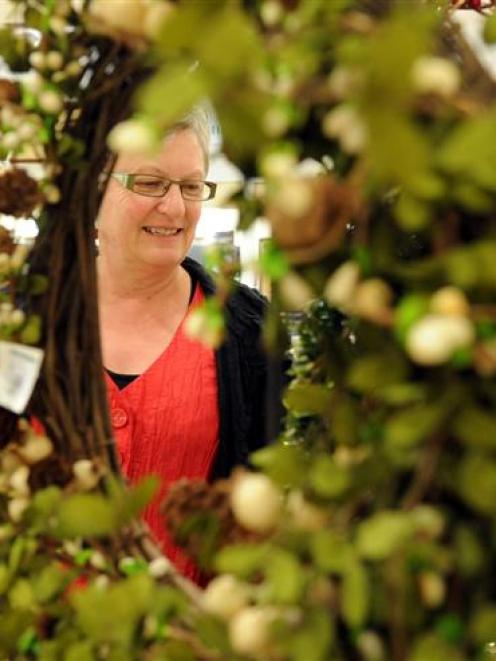 Anne Shanks, of Mosgiel, takes a moment from her busy Christmas shopping schedule to look at ...