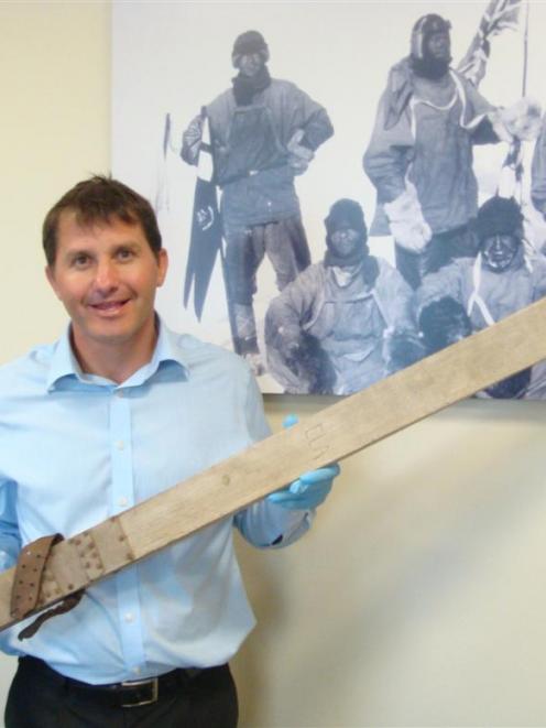 Antarctic Heritage Trust executive director Nigel Watson is pictured with one of  Dr Edward...