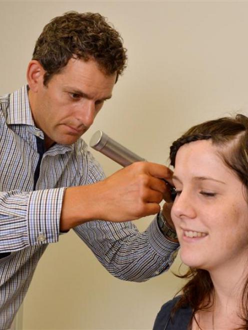 Anthony Rowcroft checks Shannon King's hearing at Bay Audiology, in Dunedin. Photo by Gerard O...