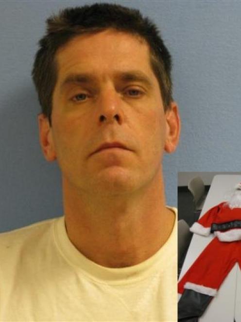 Anthony Russo, who police say dressed as Santa Claus and tried to kidnap a 12-year-old girl as...
