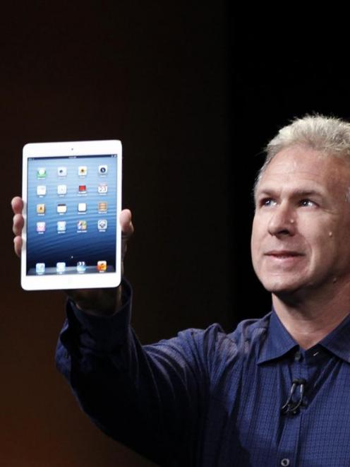 Apple senior vice president of worldwide marketing Philip Schiller introduces the new iPad mini....