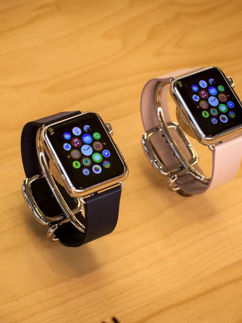Apple Watches on display at the Apple Store in New York City. Photo by Reuters.
